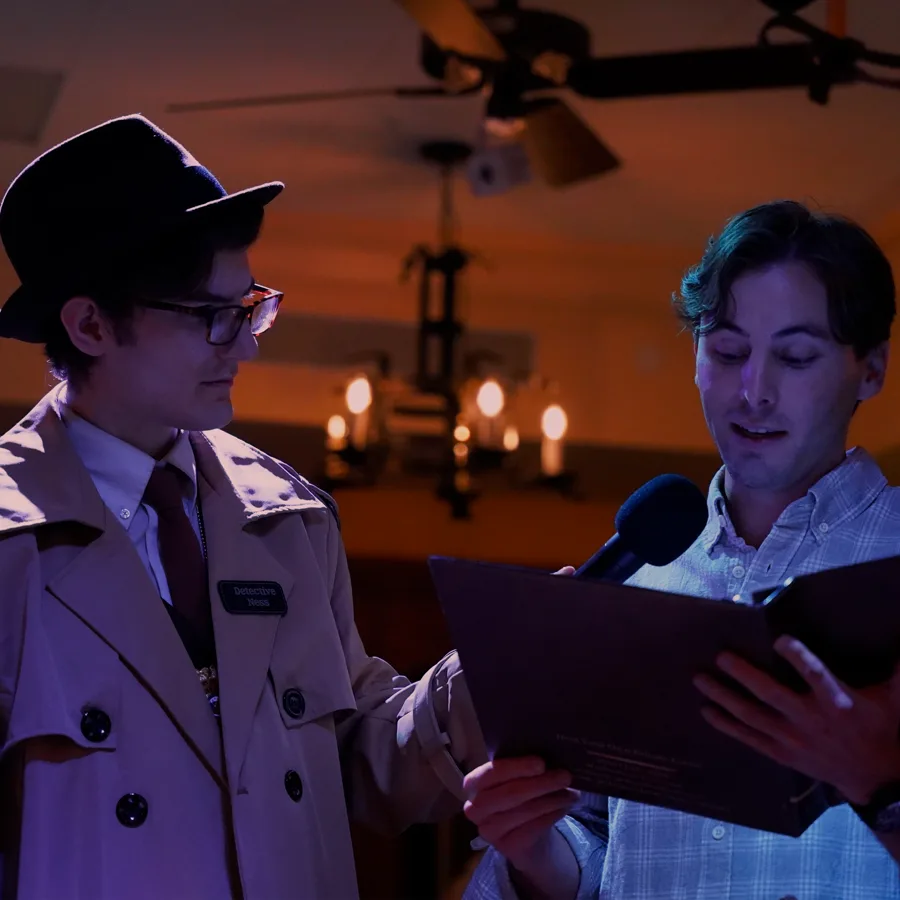 Professional actors performing at a Nashville murder mystery